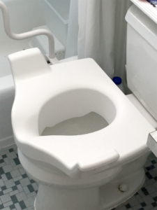 Toilet booster with handles